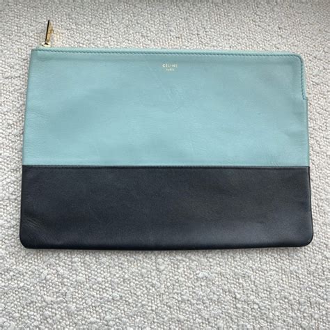 Solo clutch pouch in textile and smooth lambskin 